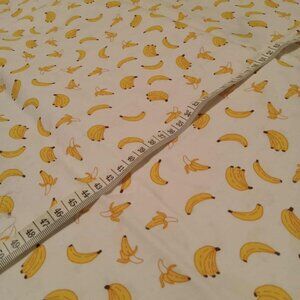 Cotton fabric with banana pattern on white background